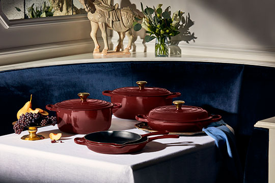 Table set with Rhone red wine colored cast iron cookware