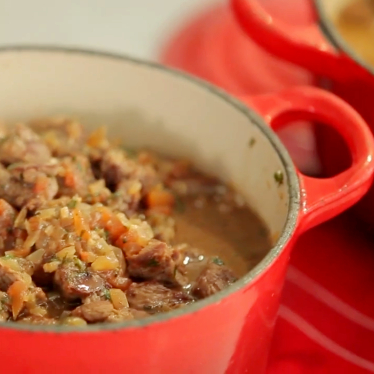 Chad Robertson works with dough in a Le Creuset bread oven