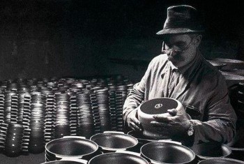 a person works with dough in a Le Creuset bread oven