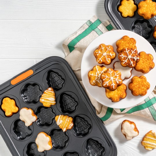snowflake shaped treats in a nonstick novelty baking pan