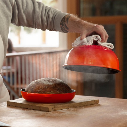 steam is released as Chad Robertson lifts the lid on a Le Creuset bread oven